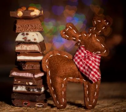 Chocolate stack on colorful bokeh background Stock Photos