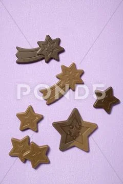 Chocolate Stars On Purple Background