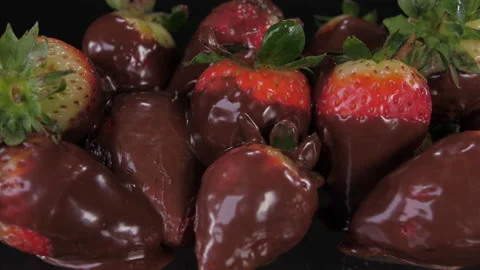 Chocolate on strawberries 4k Stock Footage 148316399