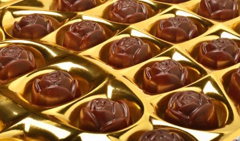 Chocolate sweets background in the box Stock Photos