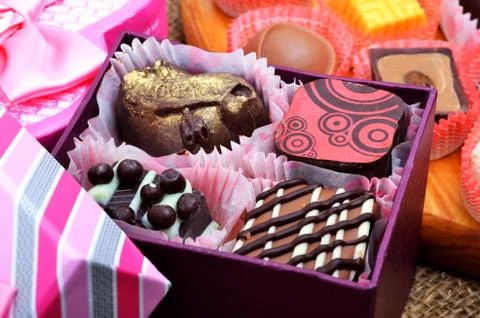 Chocolate sweets in gift boxes Stock Photos