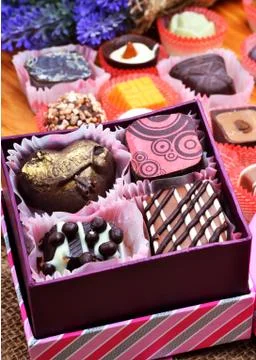 Chocolate sweets in gift boxes Stock Photos