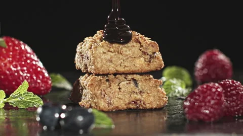 Chocolate syrup on a cookies Stock Footage 135649955