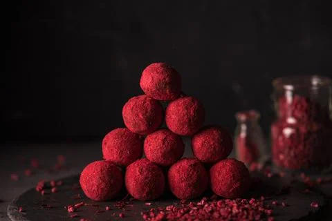 Chocolate truffle with raspberry powder Stock Photos