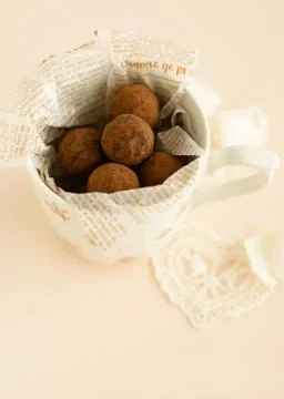 Chocolate truffles in a mug Stock Photos