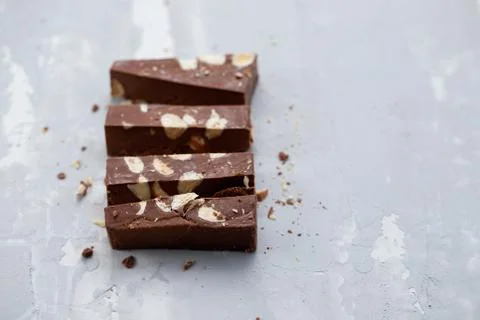 Chocolate turron on ceramic background Stock Photos