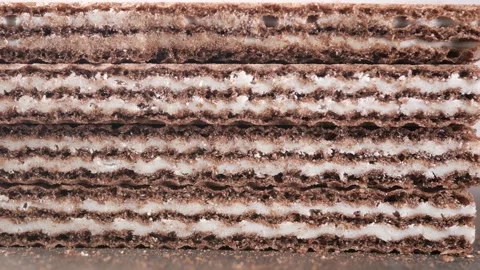 Chocolate wafer layers stacked on a table Stock Footage 329597451