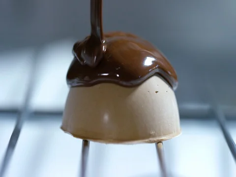 Chocolate Waterfall on a Truffle Cake Design 4K Pro Res Stock Footage 79263424