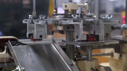 Chocolate wrapping machine individually wrapping chocolates Stock Footage 108408596