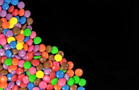 Chocolates on black Stock Photos