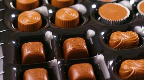 Chocolates in a box of several shapes Foto stock