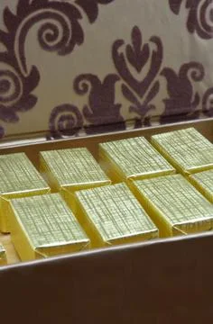 Chocolates in chocolate box Stock Photos