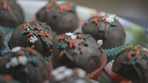 Chocolates in display case of store front Stock Footage 104867083