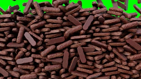 Chocolates falling down from above and filling the screen. Vídeo Stock 98634361