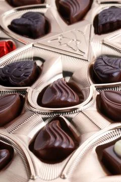 Chocolates in foil box Stock Photos
