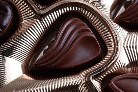 Chocolates in foil box Stock Photos