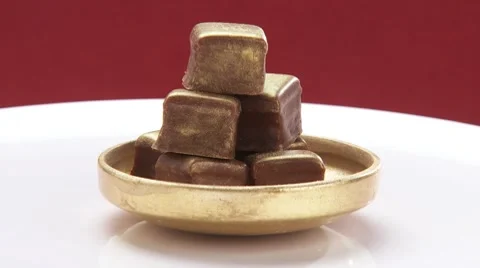 Chocolates with gold dust Stock Footage 8570864