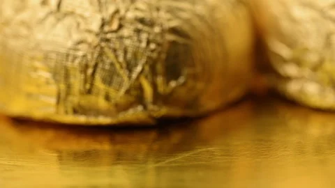 Chocolates in gold wrappers Stock Footage 329097200