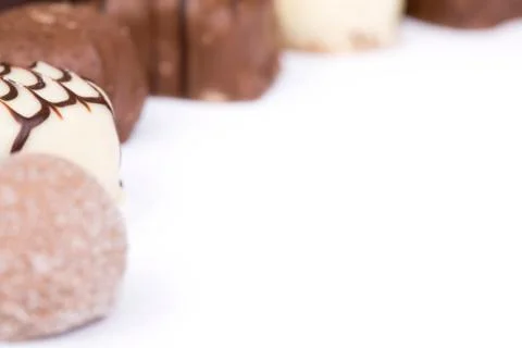 Chocolates isolated Stock Photos