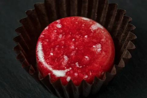 Chocolates in paper sockets Stock Photos