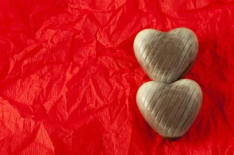 Chocolates in the shape of hearts Stock Photos