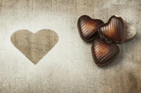 Chocolates in the shape of hearts Stock Photos