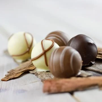 Chocolates on table Stock Photos