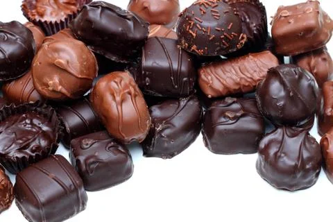 Chocolates on white Stock Photos