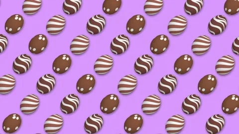 Chocolatey easter eggs on pink background Stock Footage 304269053