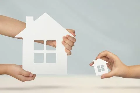 Choice between big or small house. Buying property, property comparison before Stock Photos