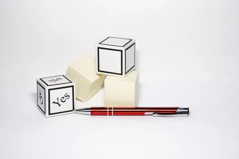 Choice between different options on cubes on a white background. Photos