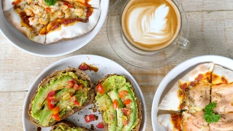 Choice Between Junk and Healthy Food - Rye Bread with Fresh Vegetables and Pizza Stock Footage 159757141