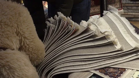 The choice of carpets in the store Stock Footage 126159035