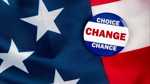 Choice change chance text on election button laying on the star spangled bann Stock Footage 170629459