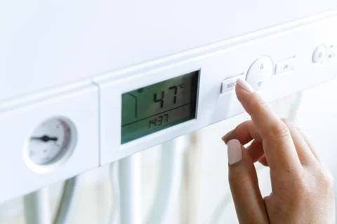 The choice of the eco mode of operation of the heating gas boiler Stock Photos