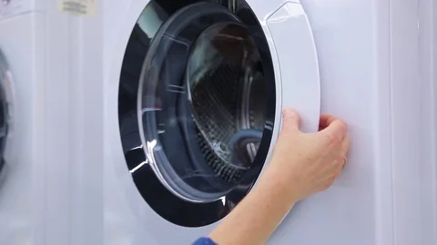 Choice of washing machine in shop, close-up Stock Footage