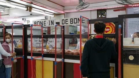 Choices of Bone in and De Bone Ham in a Store Stock Footage 228707659