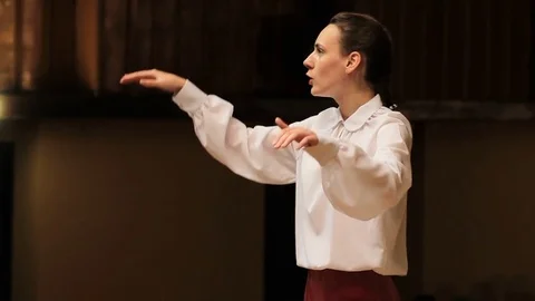 Choir conductor during performance Stock Footage 77727016