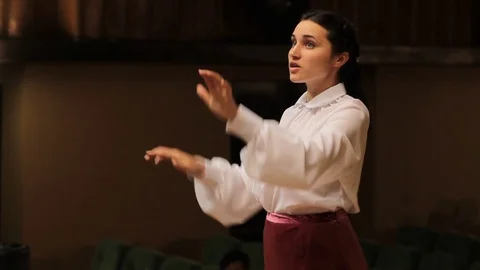 Choir conductor during performance Stock Footage 77728178