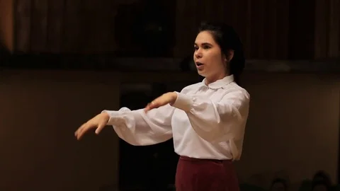 Choir conductor during performance Stock Footage 77728318