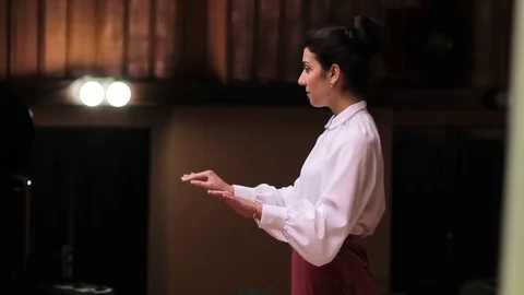 Choir conductor during performance Stock Footage 77729201