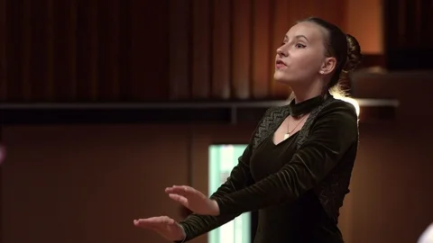 Choir conductor during performance Stock Footage 93516020