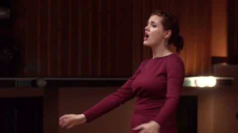 Choir conductor during performance Stock Footage 93516991