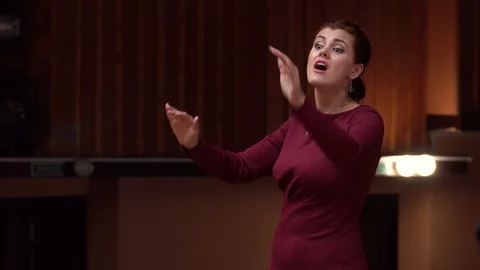 Choir conductor during performance Stock Footage 93517101