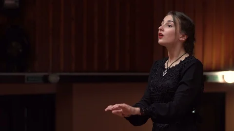 Choir conductor during performance Stock Footage 93520686