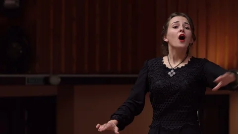 Choir conductor during performance Stock Footage 93520689