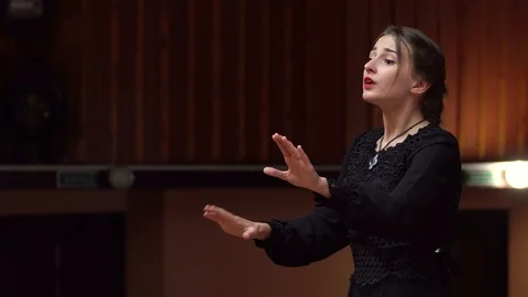 Choir conductor during performance Stock Footage 93523140