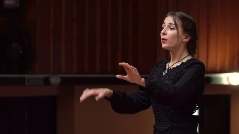 Choir conductor during performance Stock Footage 93523195