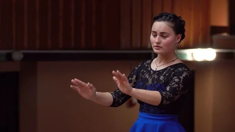 Choir conductor during performance Stock Footage 93523460