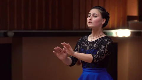 Choir conductor during performance Stock Footage 93523595